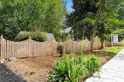 a backyard of a house with lots of green space