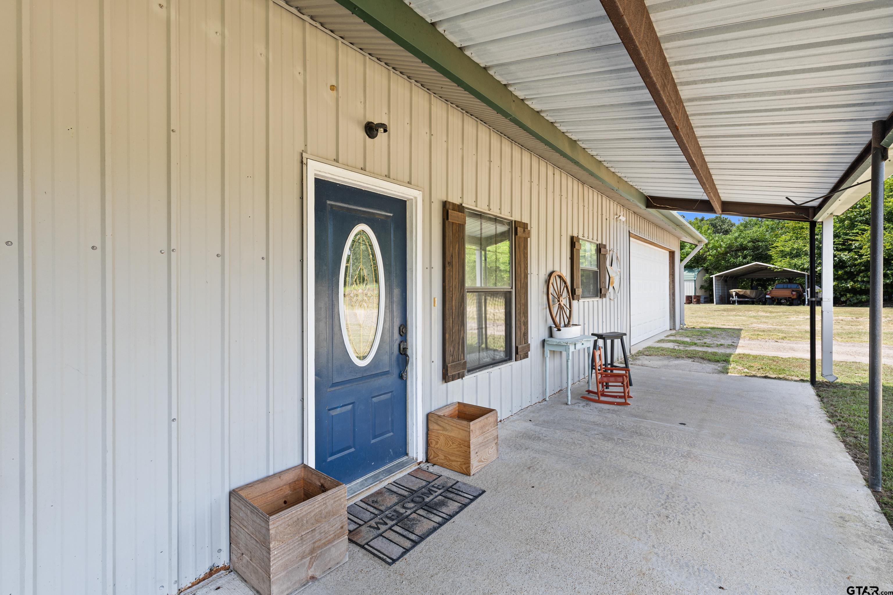 423 County Road 4306 Naples, TX 75568 - Photo 15 of 47 a view of a hallway with seating space