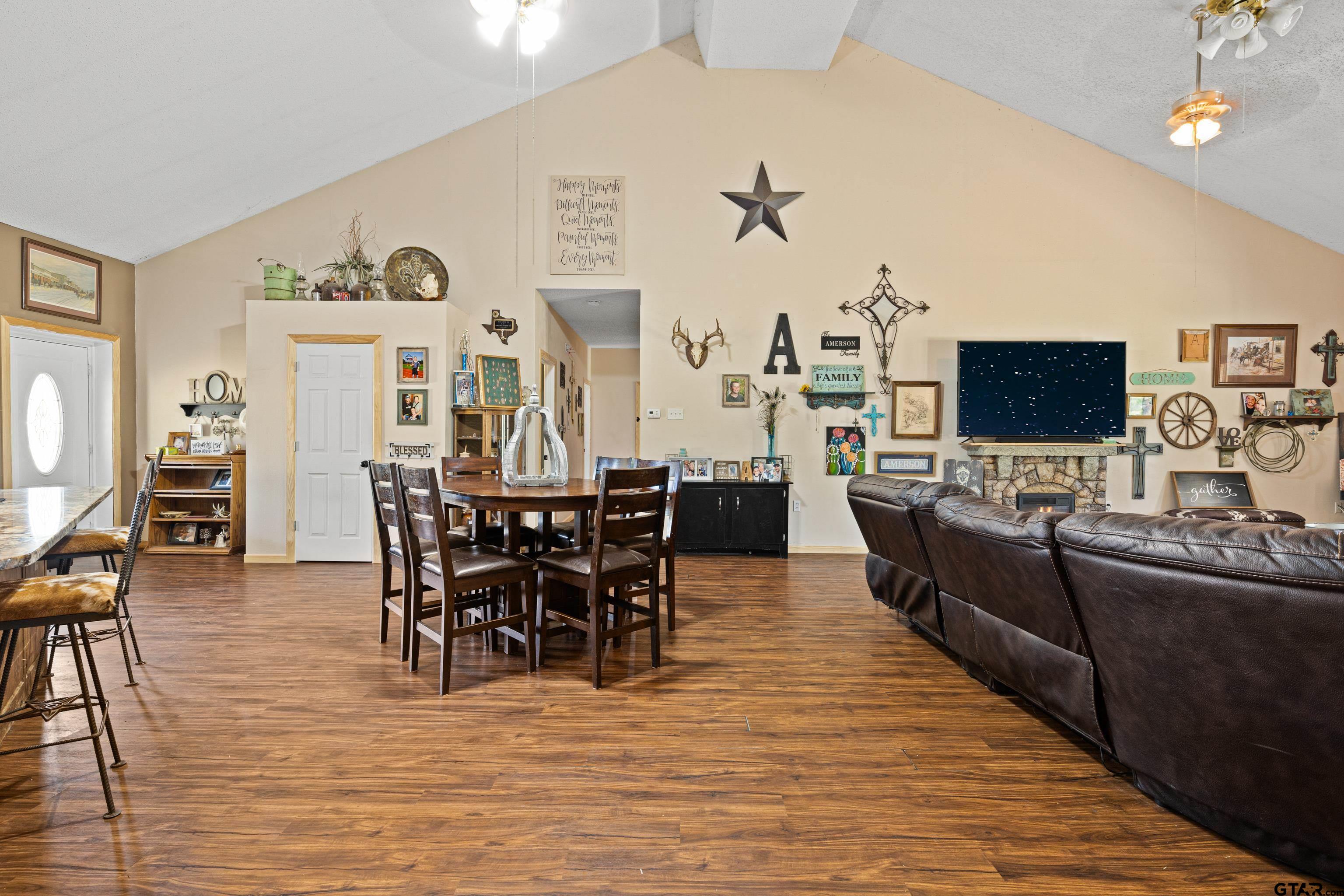 423 County Road 4306 Naples, TX 75568 - Photo 24 of 47 a view of a dining room with furniture