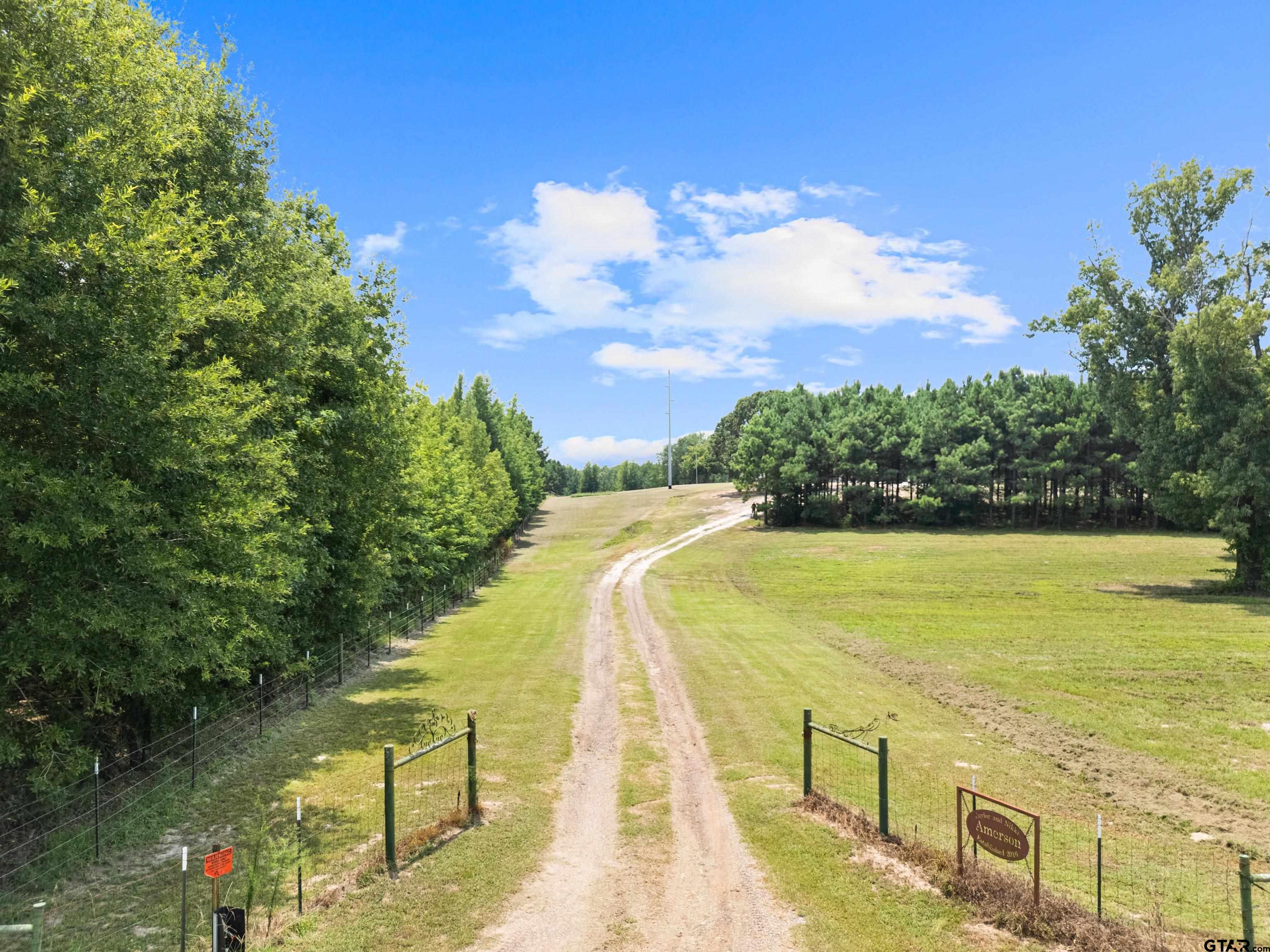 423 County Road 4306 Naples, TX 75568 - Photo 6 of 47 a view of an ocean with city