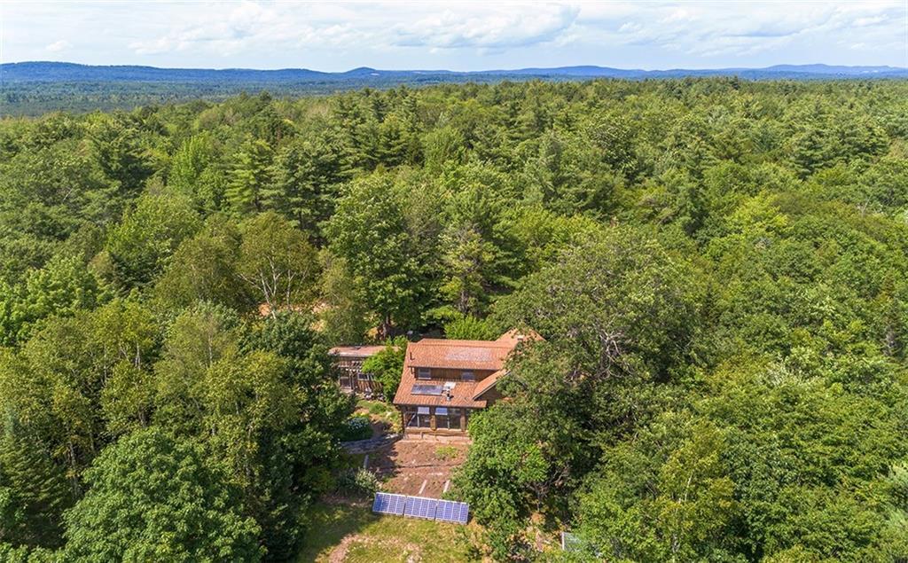 1396 West Appleton Road Appleton, ME 04862 - Photo 3 of 35 Aerial shot of the home and solar...