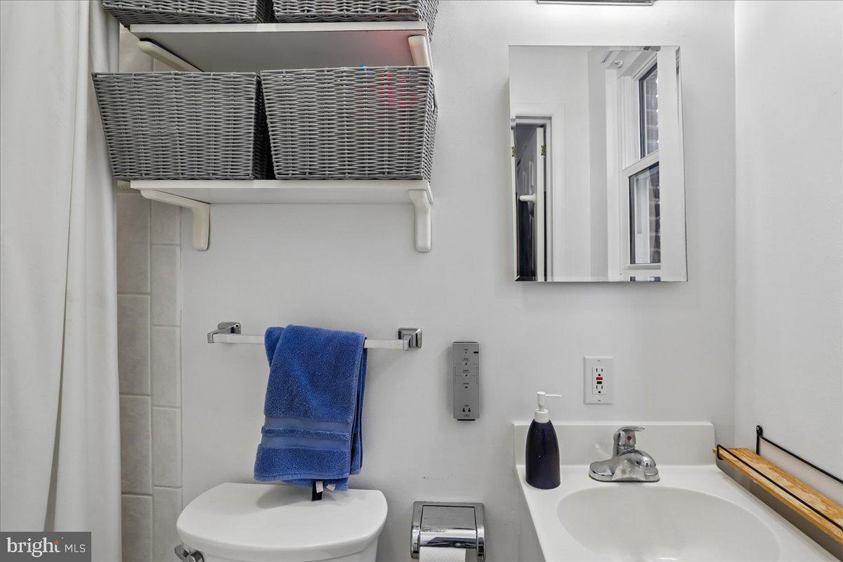 1703 Tilton Drive Silver Spring, MD 20902 - Photo 17 of 39 Sleek and modern bathroom oasis.
