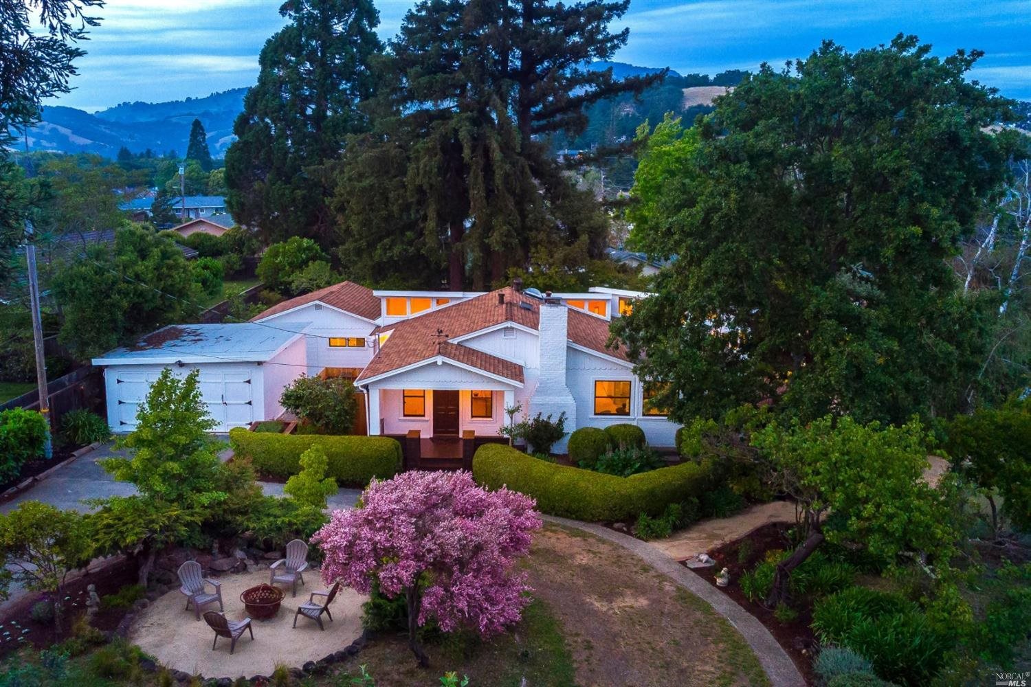 2144 Center Road Novato, CA 94947 - Photo 1 of 1 a front view of a house with a yard and fountain