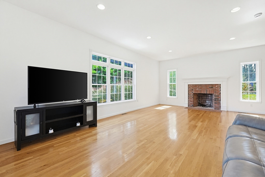 11 Broken Tree Road Medway, MA 02053 - Photo 13 of 42 a living room with furniture and a flat screen tv