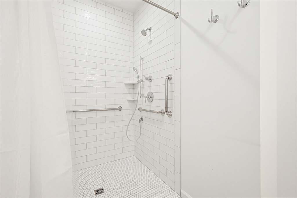 11 Broken Tree Road Medway, MA 02053 - Photo 17 of 42 a bathroom with a shower
