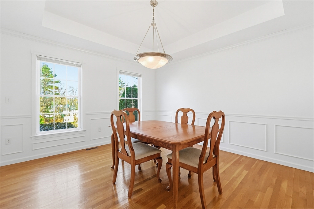 11 Broken Tree Road Medway, MA 02053 - Photo 10 of 42 a view of a dining room with furniture window and wooden floor