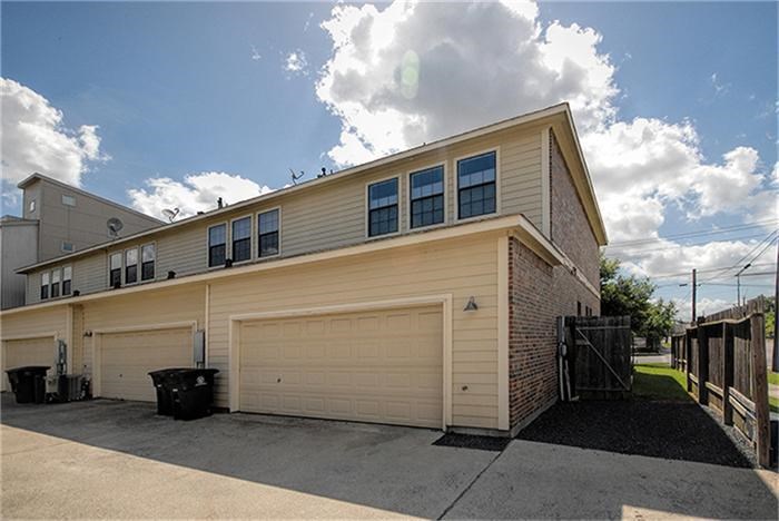 1414 Emancipation Avenue, Unit A Houston, TX 77003 - Photo 20 of 22 a view of a house with a yard