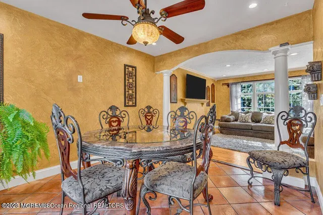 a view of a dining room with furniture