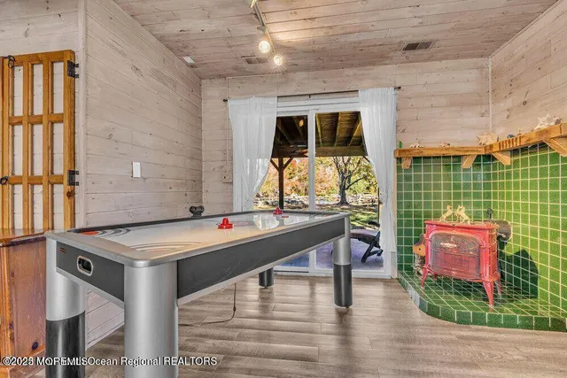 a dining room with a table and chairs