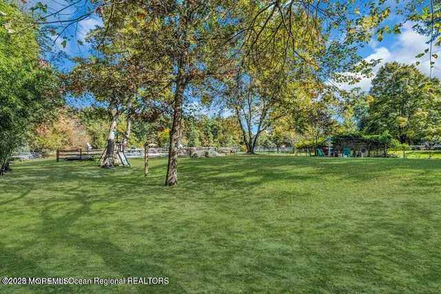 a view of a swimming pool with a lounge chairs
