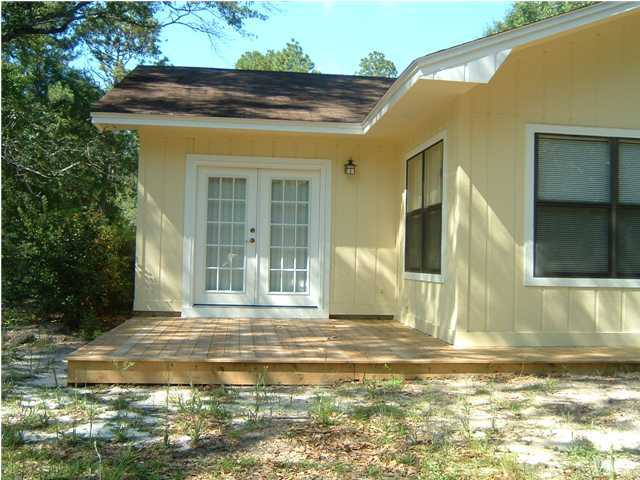 6151 Donald Guy Road Crestview, FL 32539 - Photo 7 of 24 a view of a house with a swimming pool