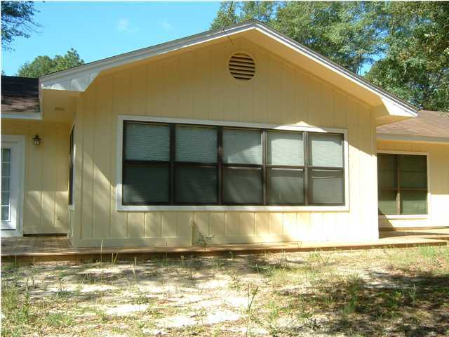 6151 Donald Guy Road Crestview, FL 32539 - Photo 8 of 24 a view of a house with a ocean view