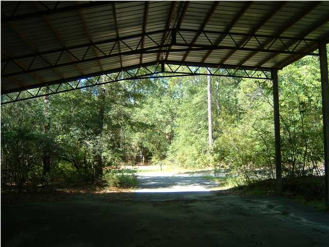 6151 Donald Guy Road Crestview, FL 32539 - Photo 10 of 24 a view of a backyard of the house