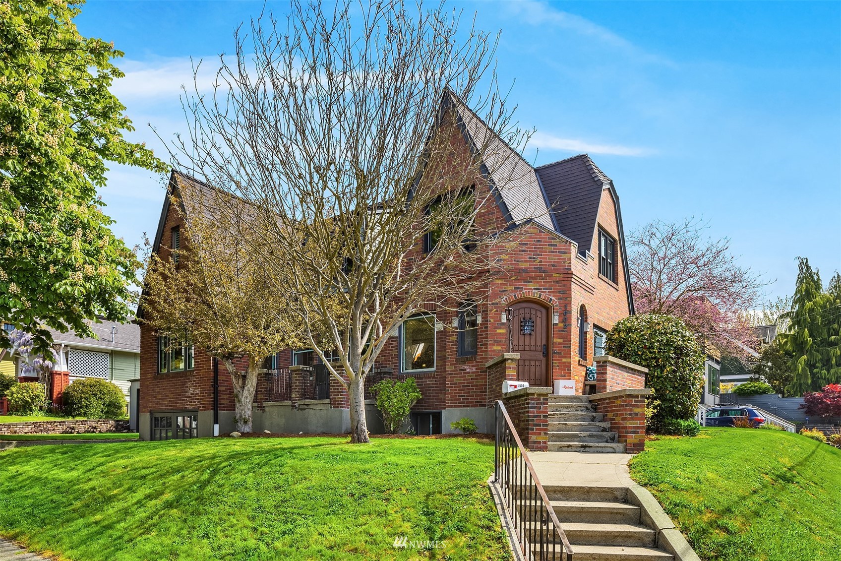 a front view of a house with a yard