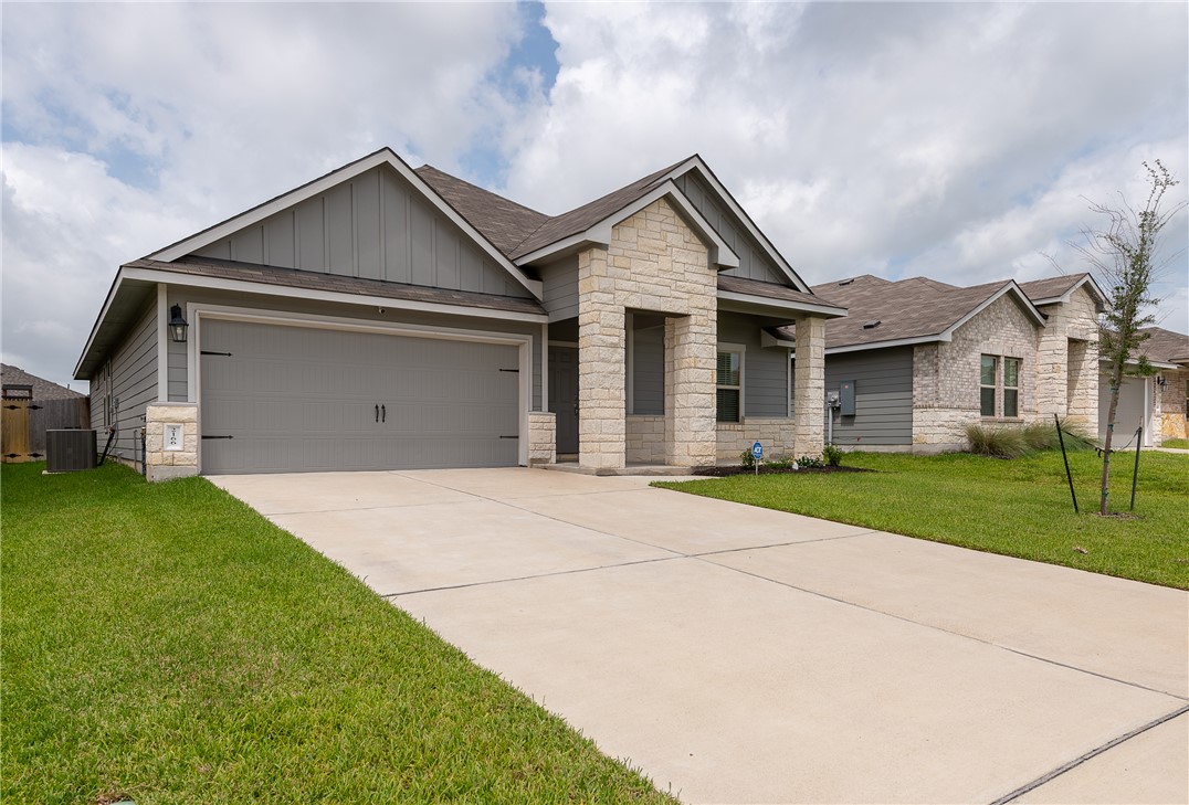 2166 Chief Street Bryan, TX 77807 - Photo 3 of 18 front view of house with a yard