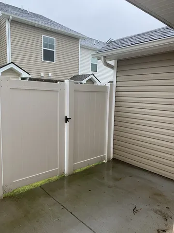a view of a garage and car parked