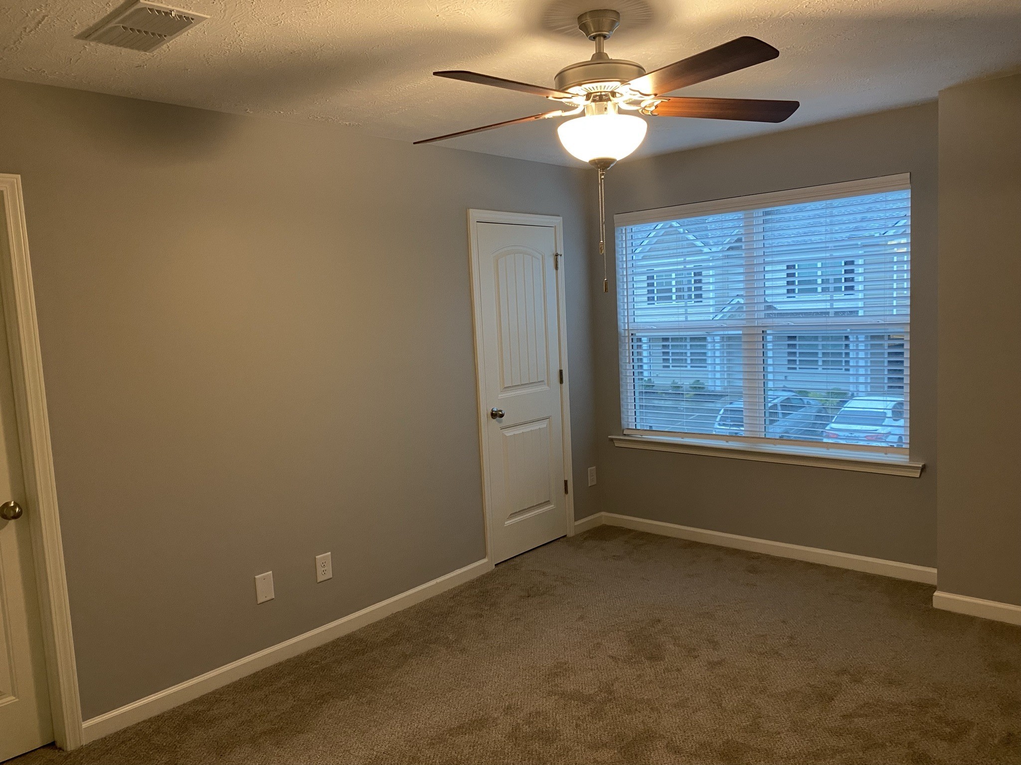 2378 Age Avenue Murfreesboro, TN 37130 - Photo 23 of 33 an empty room with windows and fan