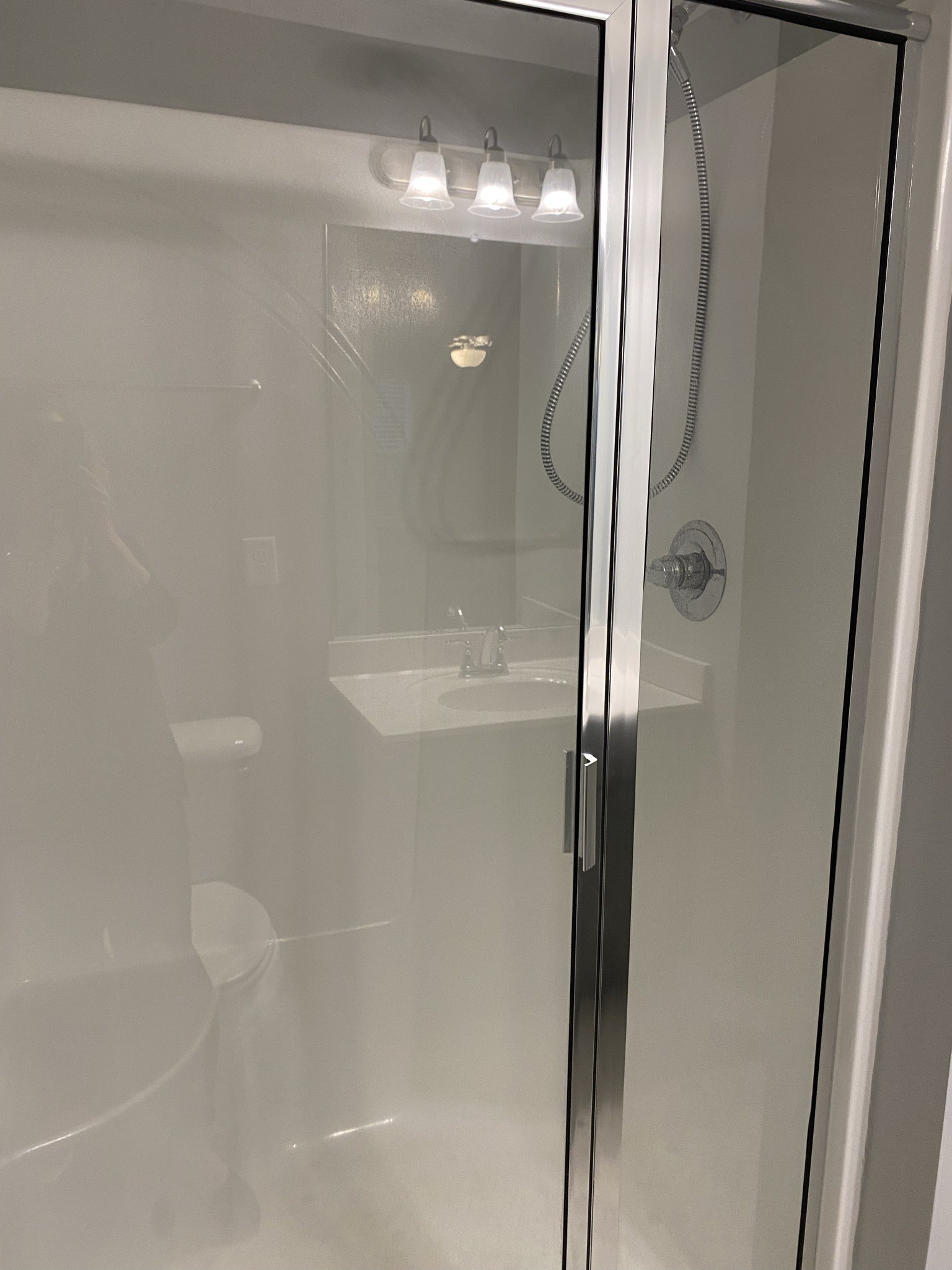 2378 Age Avenue Murfreesboro, TN 37130 - Photo 27 of 33 a bathroom with a glass shower door