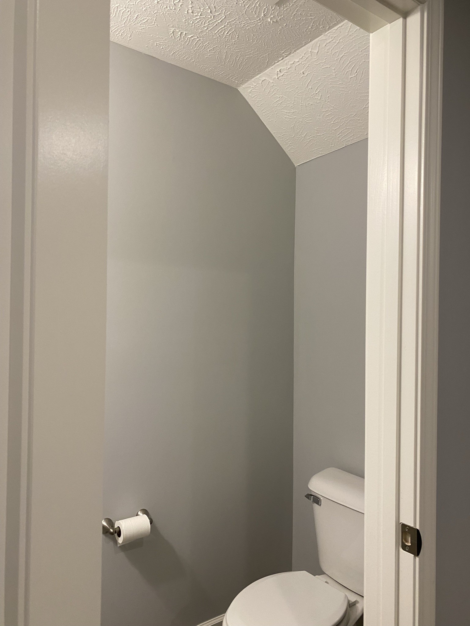 2378 Age Avenue Murfreesboro, TN 37130 - Photo 7 of 33 a white toilet sitting next to a white sink and vanity