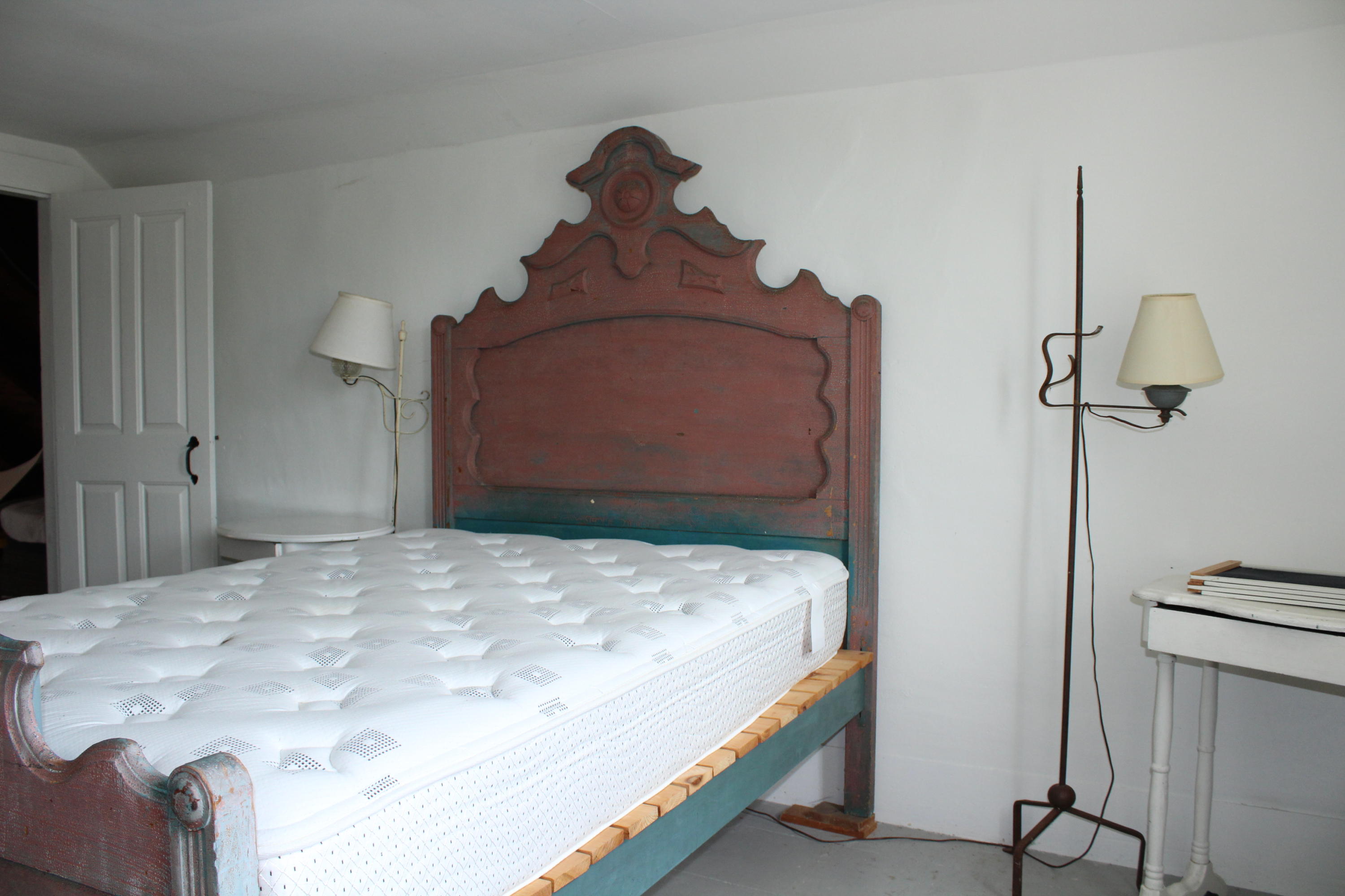 9 Castle Road Truro, MA 02666 - Photo 23 of 65 a bedroom with a bed and a window