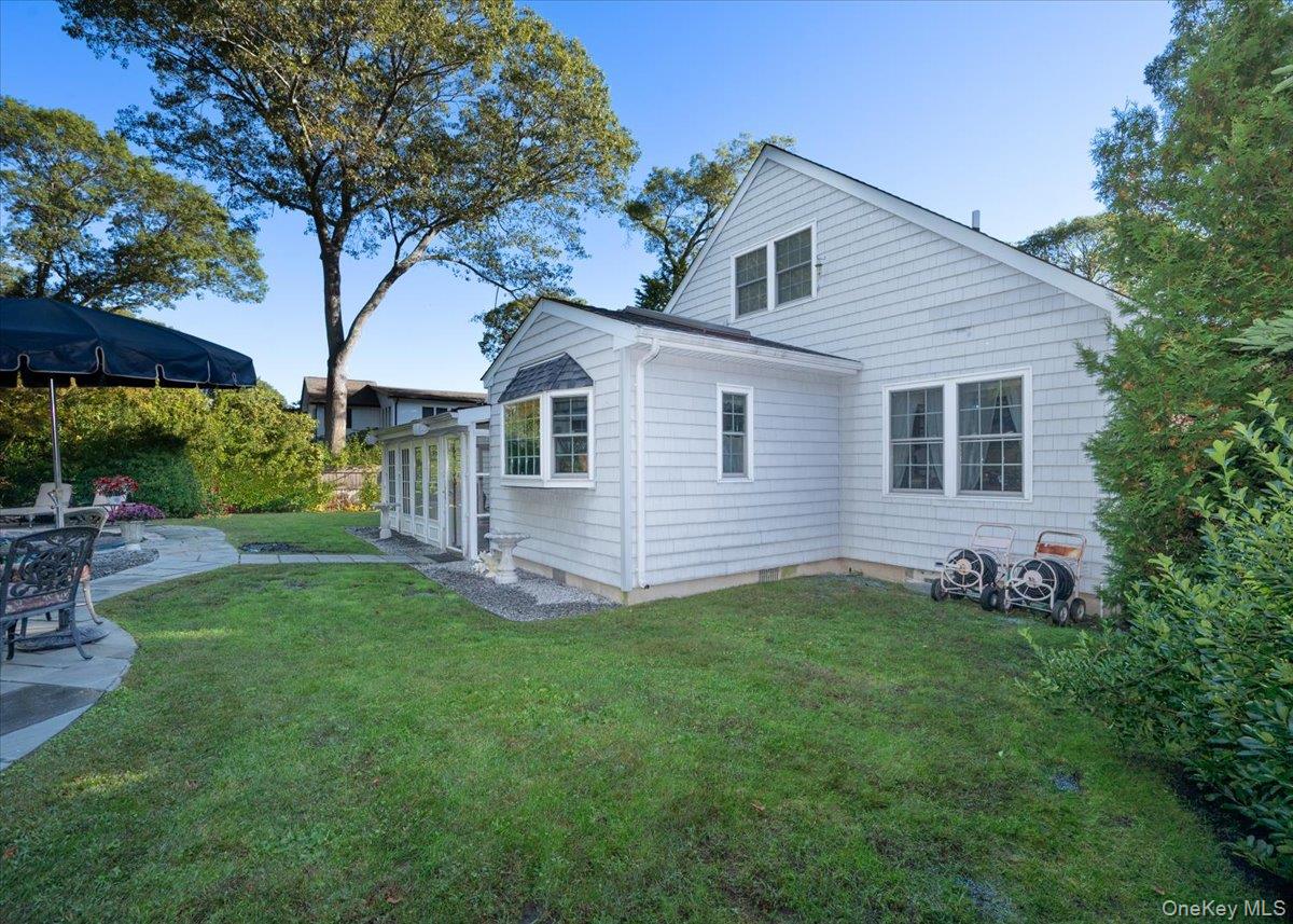 346 Ridgefield Road Hauppauge, NY 11788 - Photo 36 of 45 Back of property with a yard and a patio