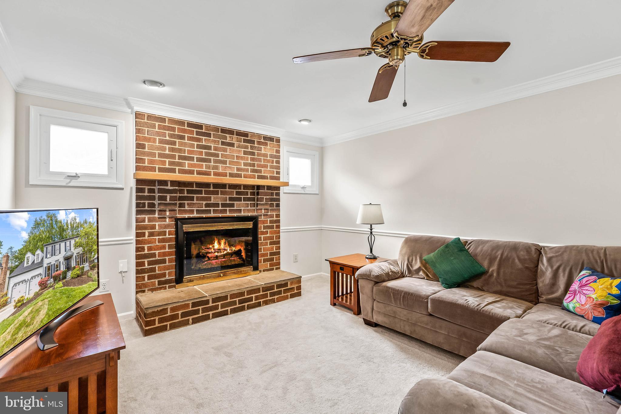 1868 Middlebridge Drive Silver Spring, MD 20906 - Photo 8 of 50 a living room with furniture and a fireplace