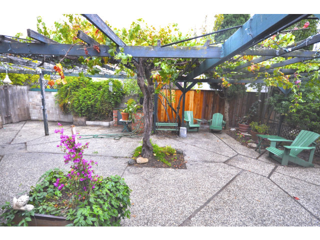 131 Hazel Avenue Millbrae, CA 94030 - Photo 16 of 16 a backyard of a house with barbeque oven