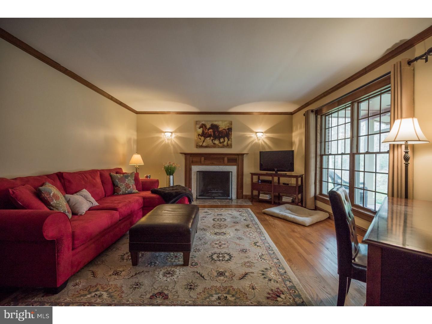 18 Gate Road Tabernacle, NJ 08088 - Photo 13 of 25 a living room with furniture a fireplace and a flat screen tv