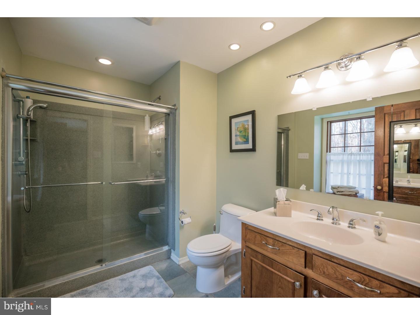 18 Gate Road Tabernacle, NJ 08088 - Photo 8 of 25 a bathroom with a double vanity sink toilet mirror and shower