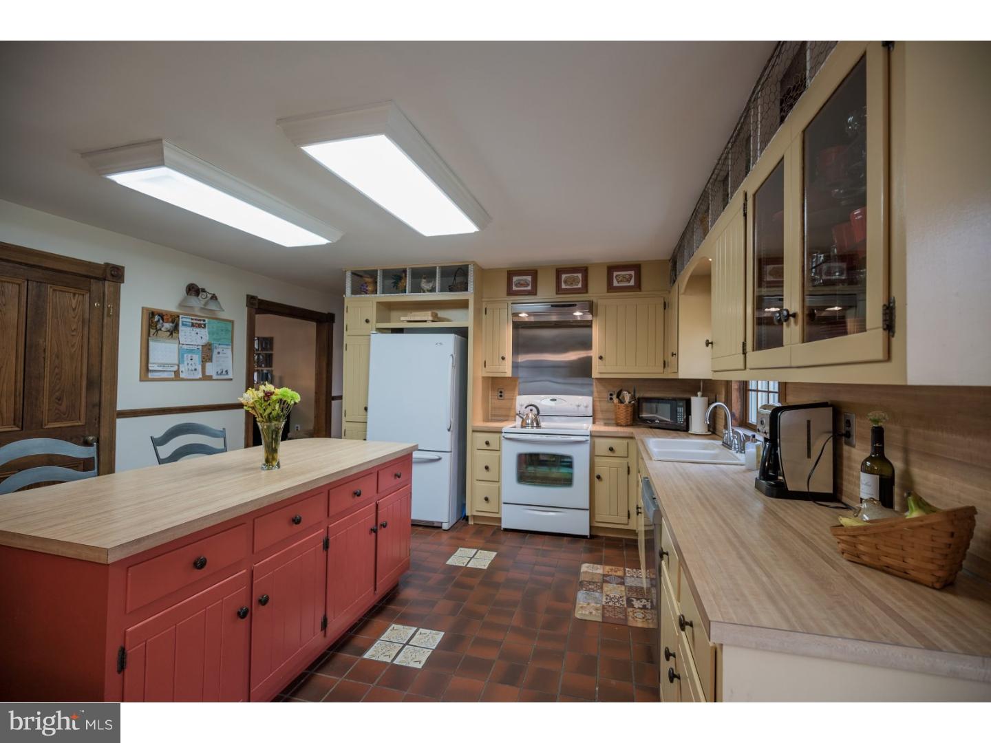 18 Gate Road Tabernacle, NJ 08088 - Photo 9 of 25 a kitchen with a refrigerator and a stove top oven