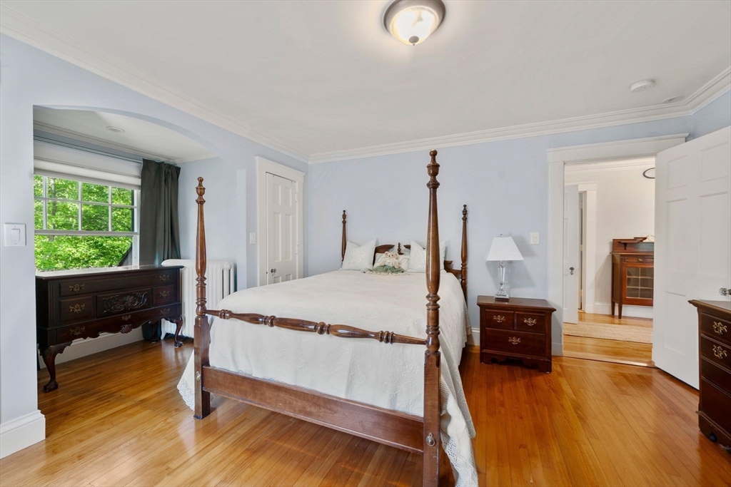 210 Upland Road Newton, MA 02460 - Photo 25 of 41 a bed room with a bed furniture and a window