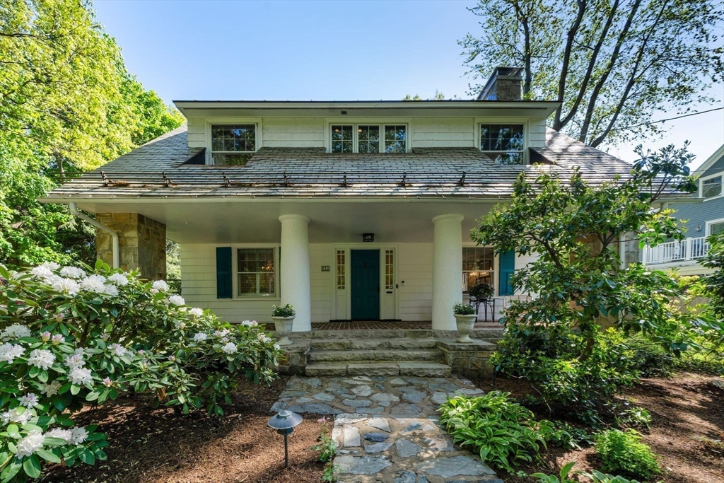 210 Upland Road Newton, MA 02460 - Photo 32 of 41 a view of a house with a garden