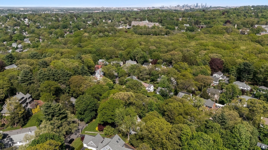 210 Upland Road Newton, MA 02460 - Photo 38 of 41 an aerial view of residential houses with outdoor space and trees