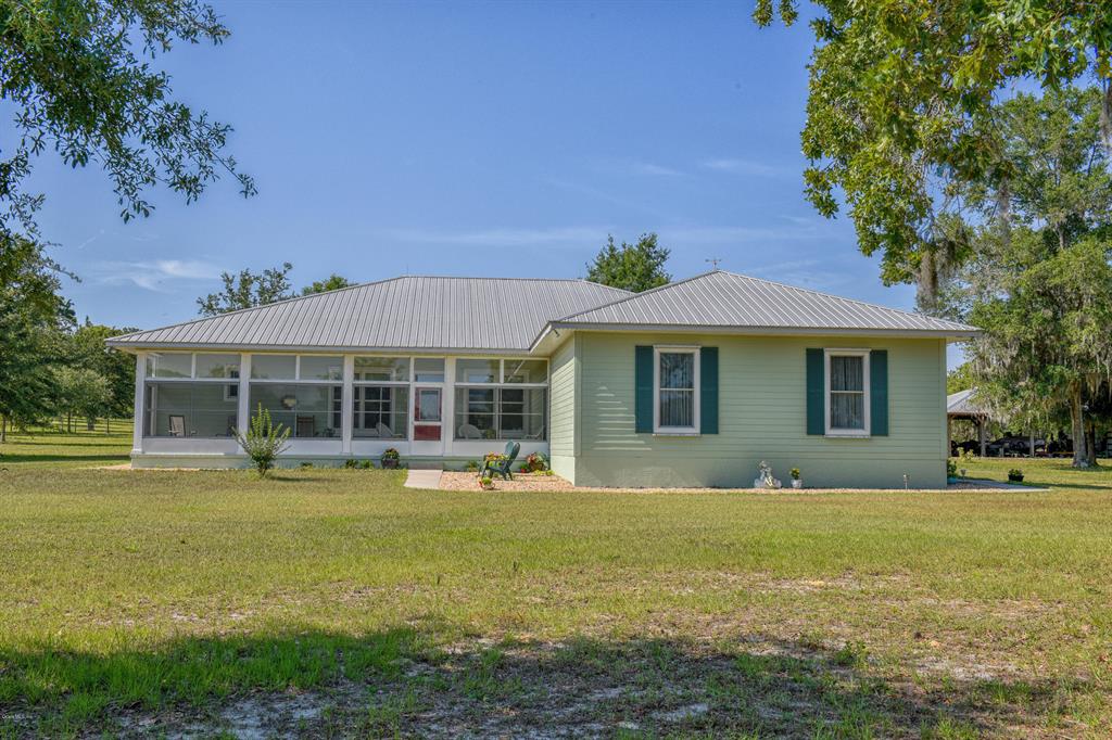 6534 West Dunnellon Road Dunnellon, FL 34433 - Photo 1 of 1 Inviting front porch