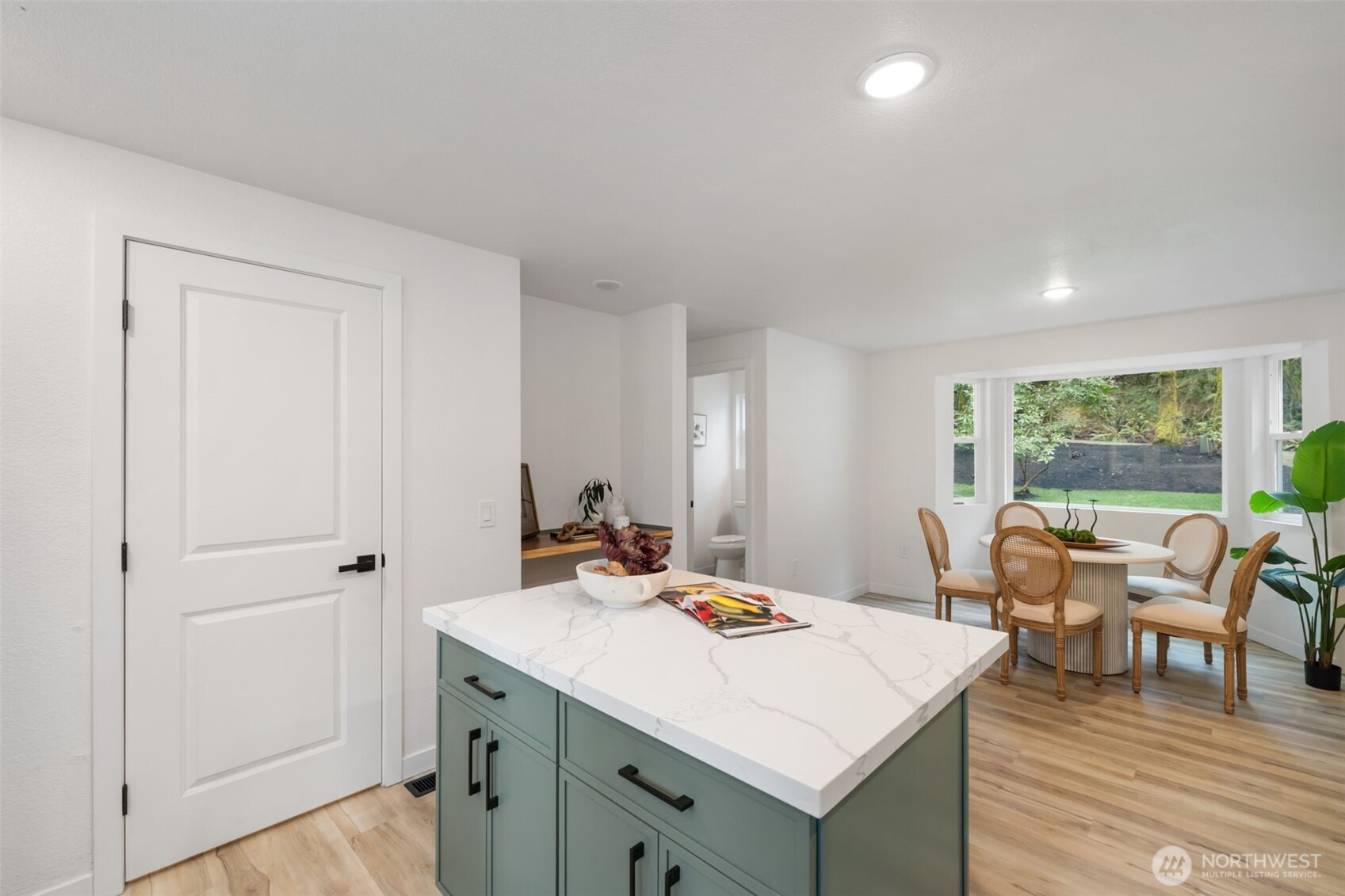 120 East Stadium Lane Grapeview, WA 98546 - Photo 12 of 34 a view of a kitchen area with furniture and window