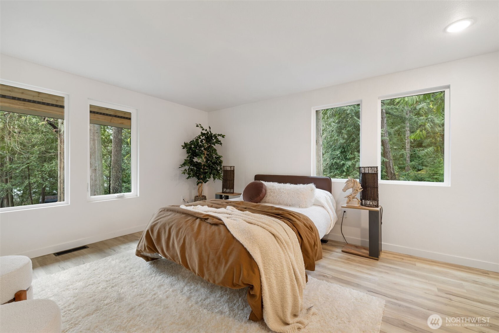 120 East Stadium Lane Grapeview, WA 98546 - Photo 13 of 34 a bedroom with bed and a large window