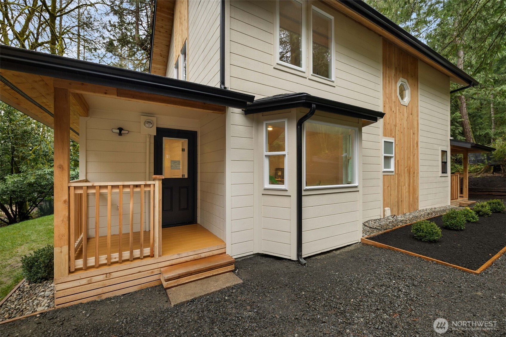120 East Stadium Lane Grapeview, WA 98546 - Photo 20 of 34 a view of a house with a door and a window