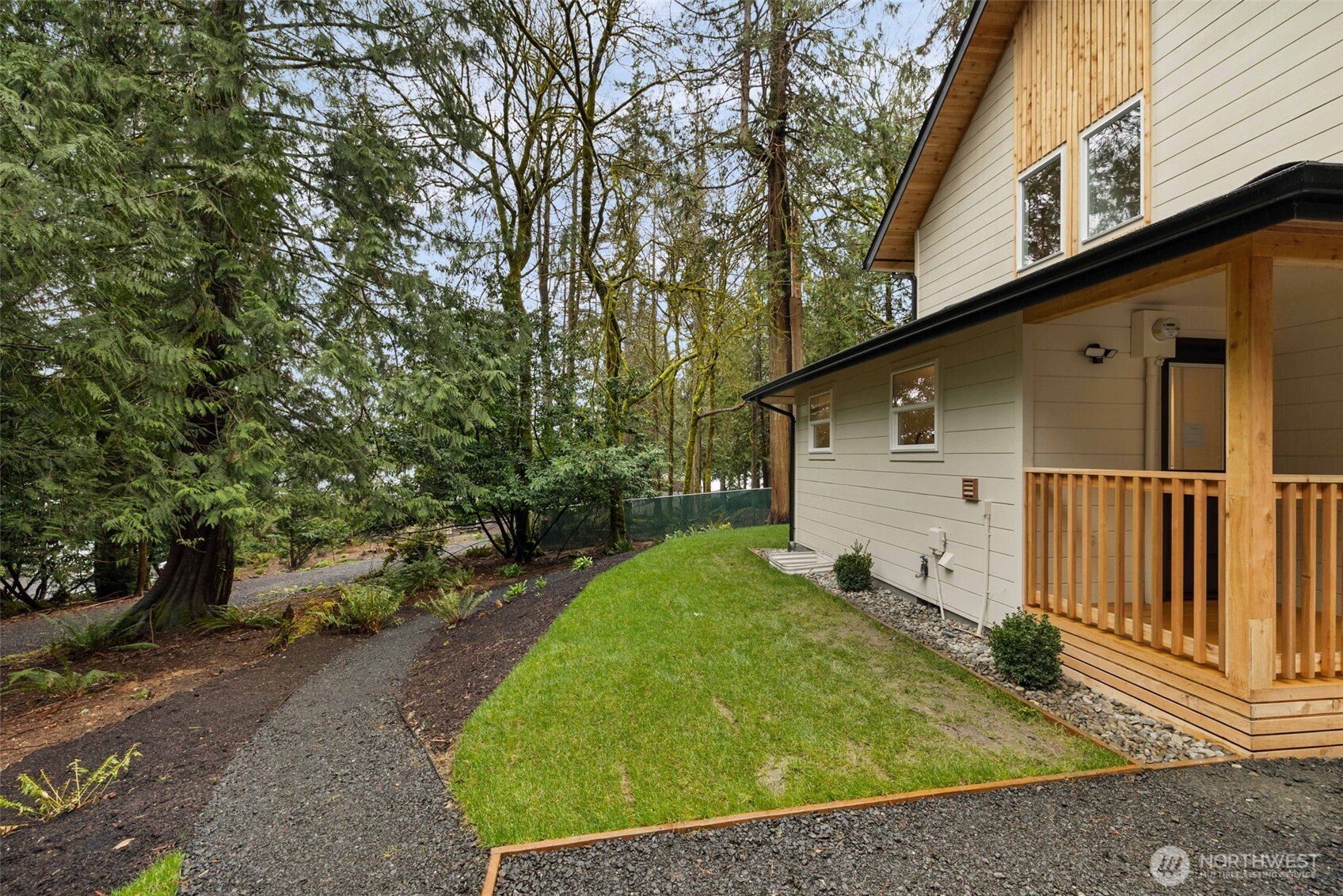 120 East Stadium Lane Grapeview, WA 98546 - Photo 25 of 34 a view of a back yard of the house