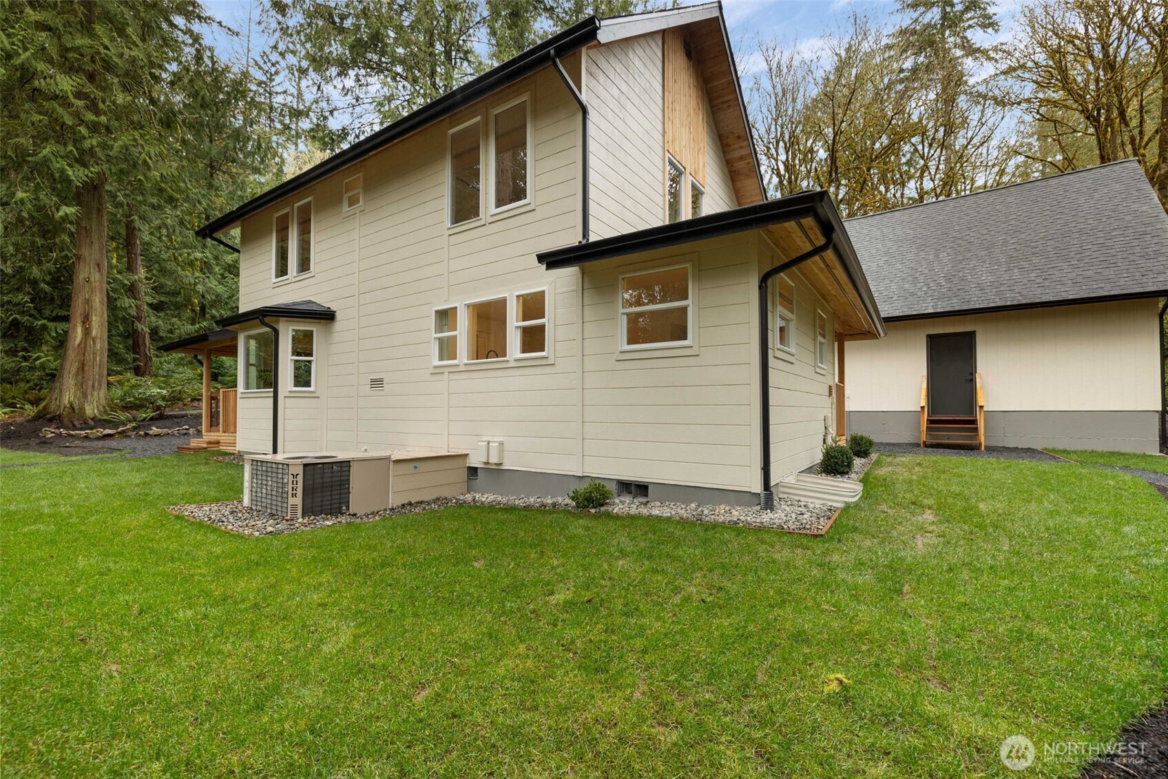 120 East Stadium Lane Grapeview, WA 98546 - Photo 26 of 34 a front view of house with yard and green space