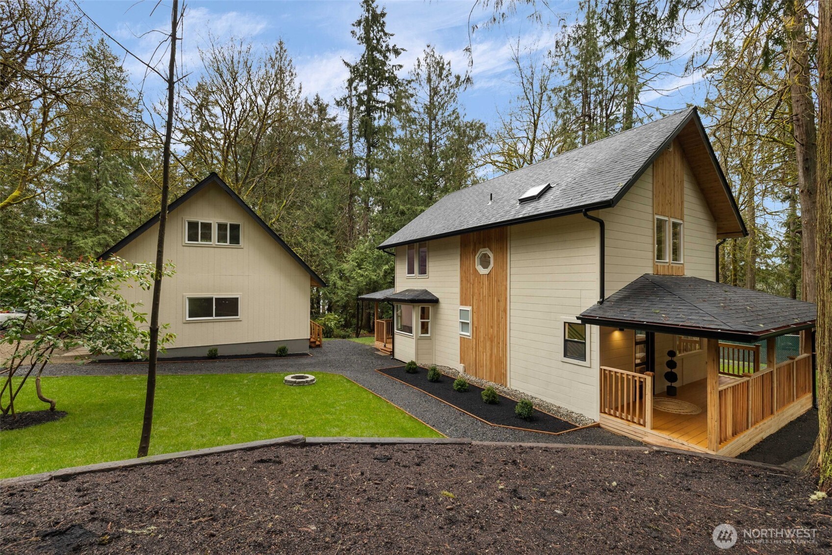 120 East Stadium Lane Grapeview, WA 98546 - Photo 29 of 34 a front view of house with yard and entertaining space