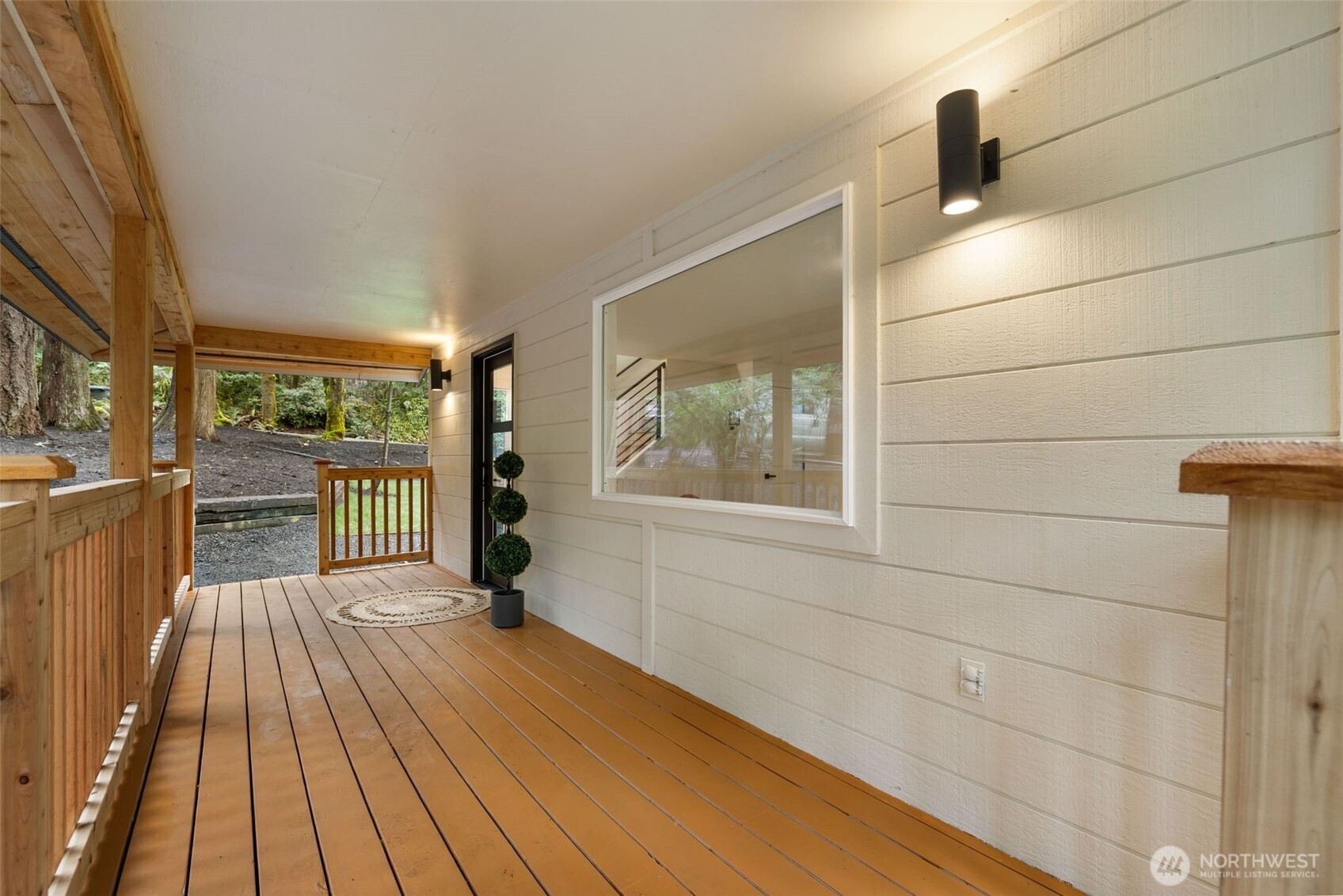 120 East Stadium Lane Grapeview, WA 98546 - Photo 5 of 34 a view of empty room with wooden floor and fan