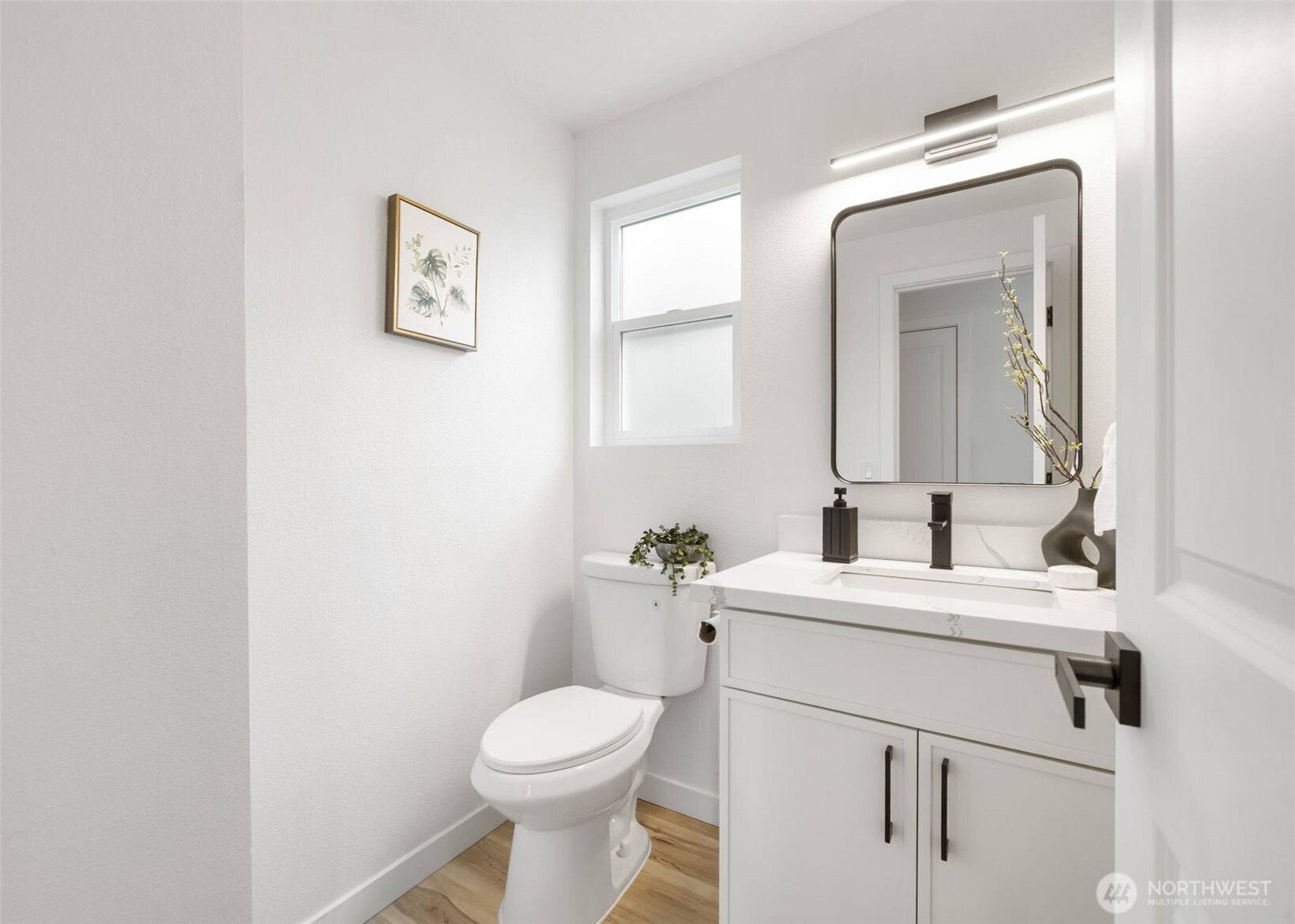 120 East Stadium Lane Grapeview, WA 98546 - Photo 9 of 34 a bathroom with a toilet sink and mirror