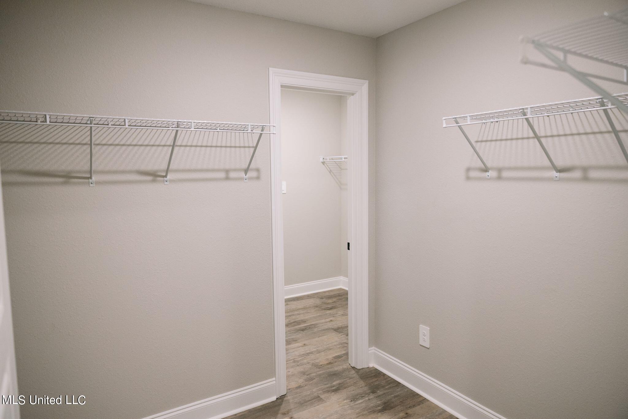 201 Savannah Gdns Road, Unit 1 Ocean Springs, MS 39564 - Photo 8 of 11 Primary Walk In Closet