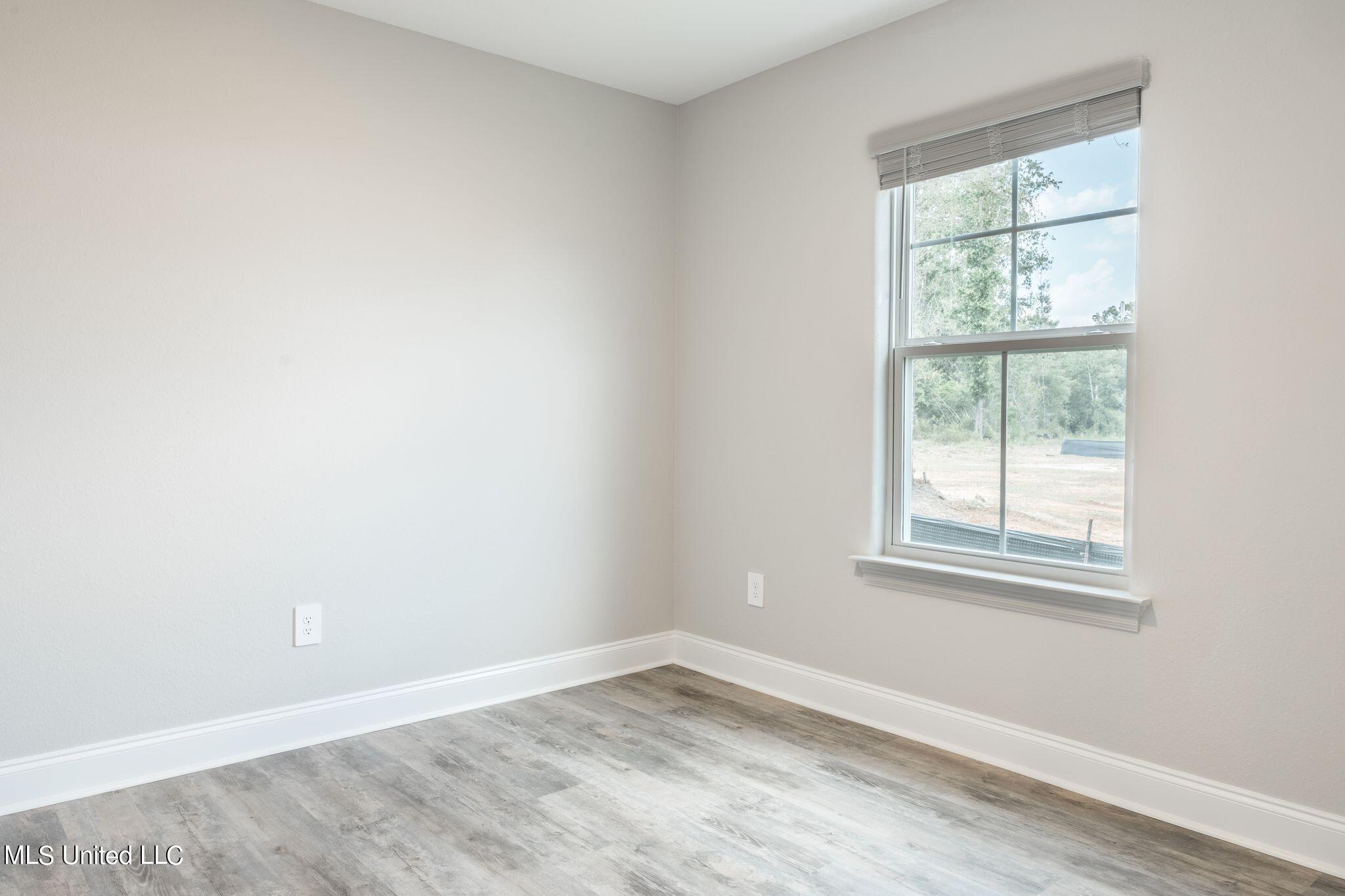201 Savannah Gdns Road, Unit 1 Ocean Springs, MS 39564 - Photo 10 of 11 Guest Bedroom