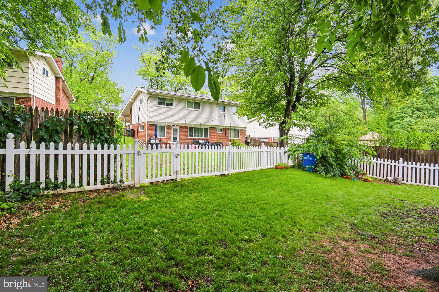 907 Hoyt Street Silver Spring, MD 20902 - Photo 64 of 69 a view of a house with a small yard and fence