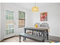 7705 Grovedale Trail Austin, TX 78729 - Photo 5 of 25 a dining room with furniture and window
