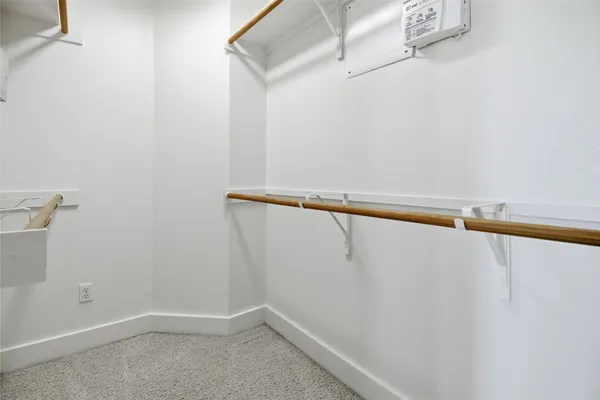 a view of small space with racks on the wall