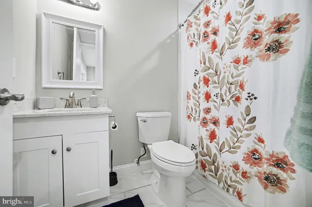 a bathroom with a sink and a toilet