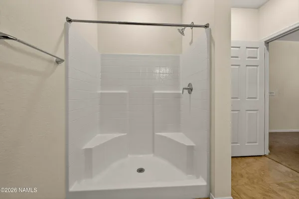 a view of empty room with windows