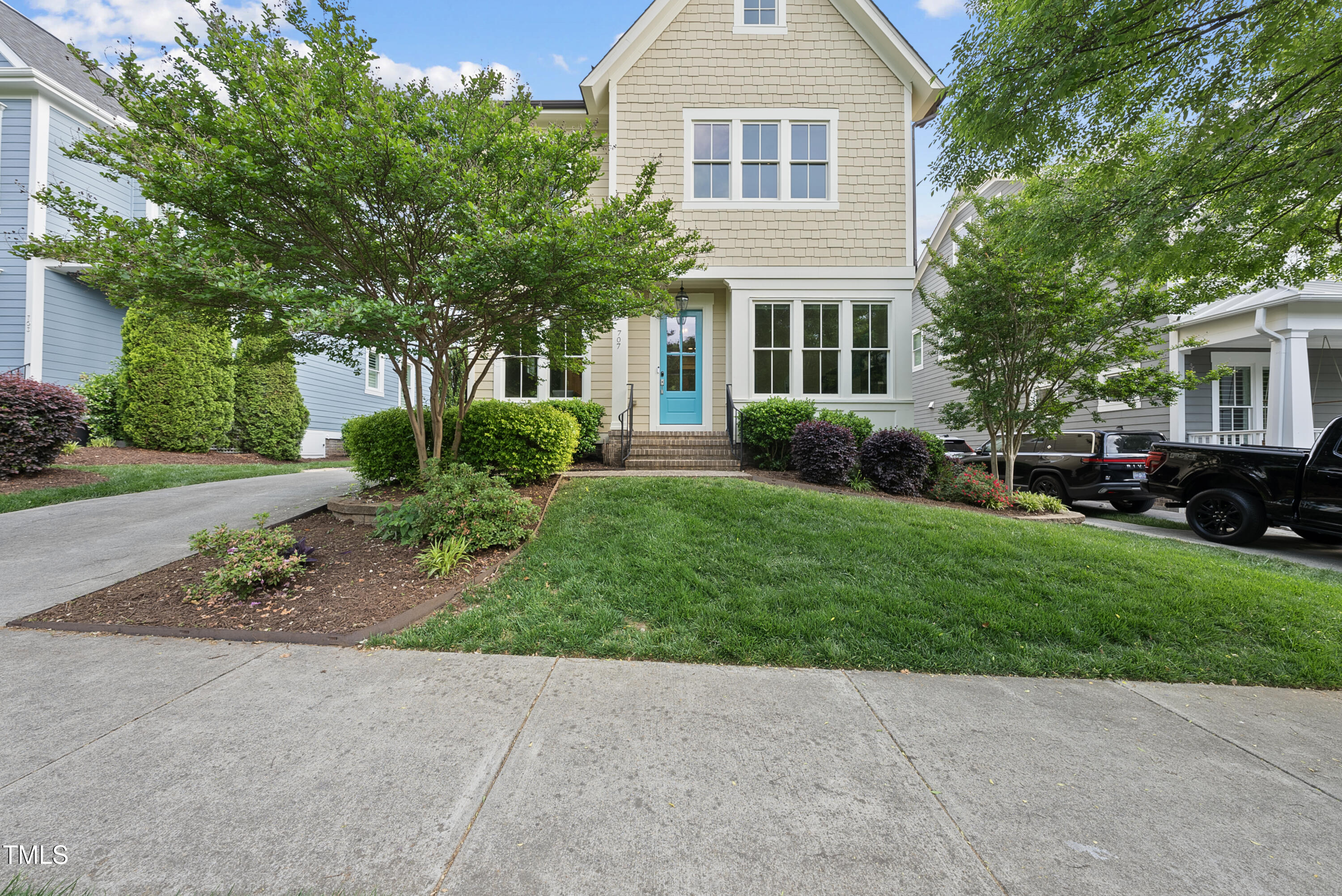 707 Sasser Street Raleigh, NC 27604 - Photo 1 of 38 front view of a house with a yard